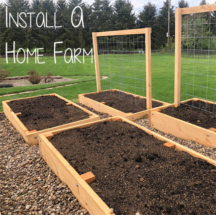Picture is a link. Picture of newly installed raised beds with the text 