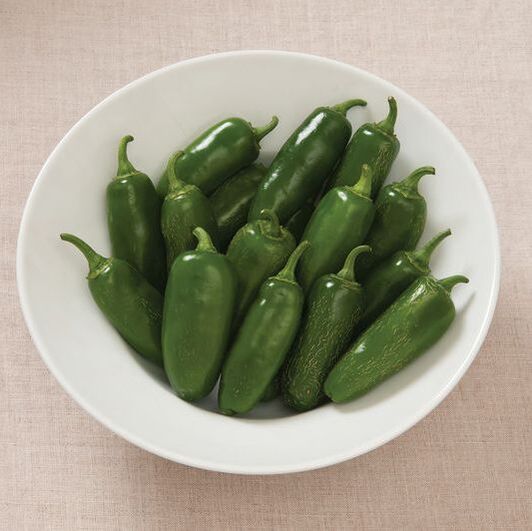 Picture of green jalapeno peppers in a bowl